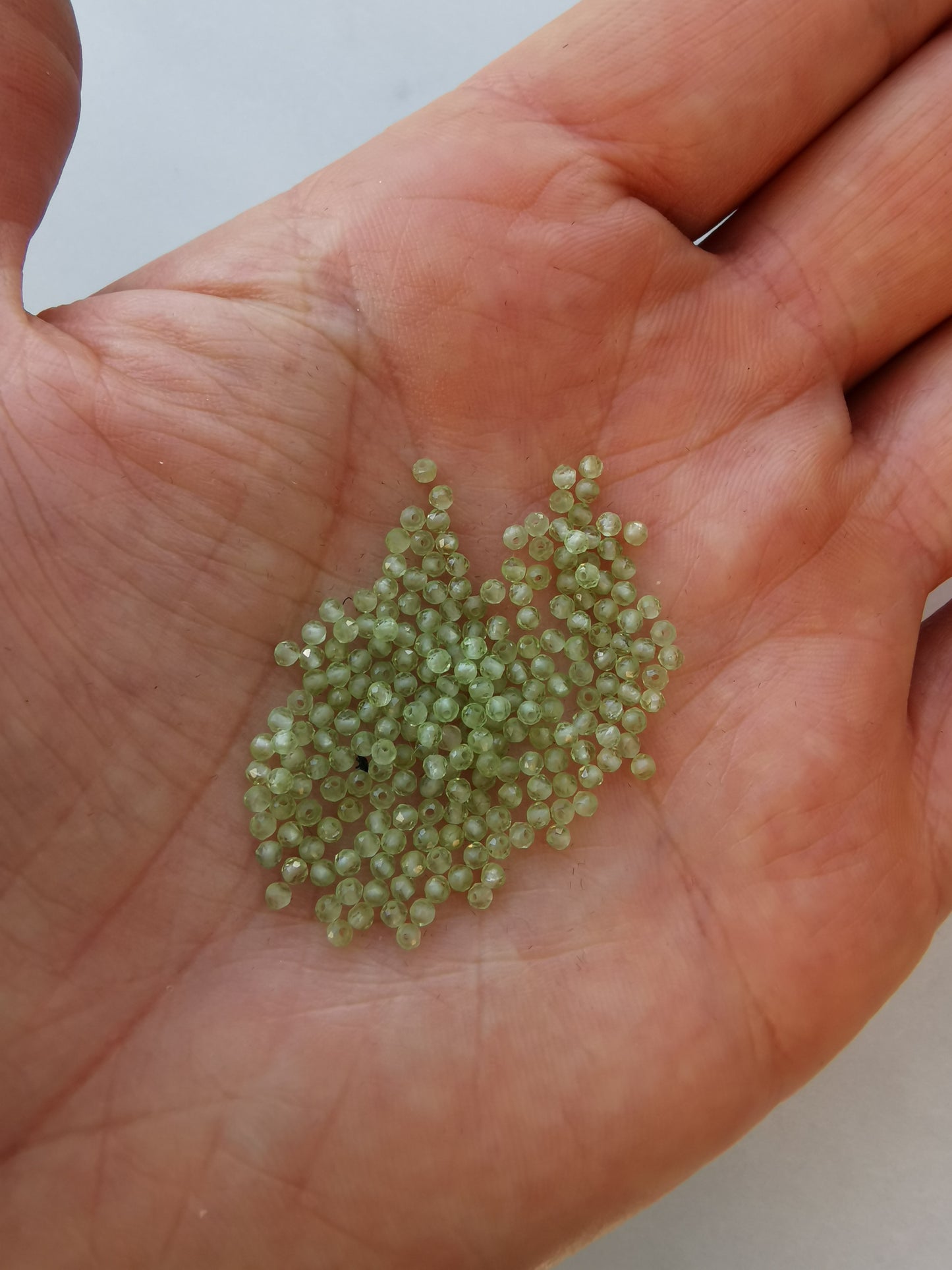 Peridot perle - rund facet - 10 stk