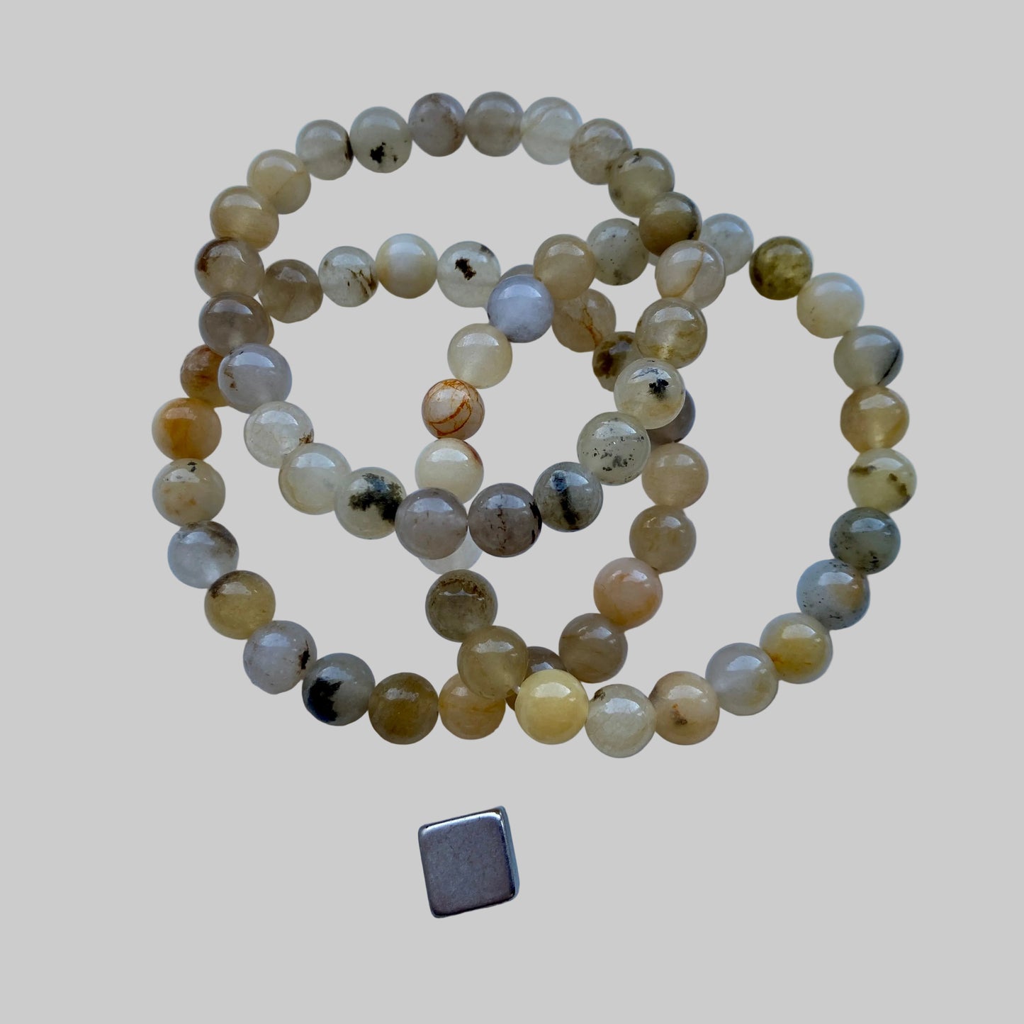 Smukt armbånd i agat og karneol med varm energi.