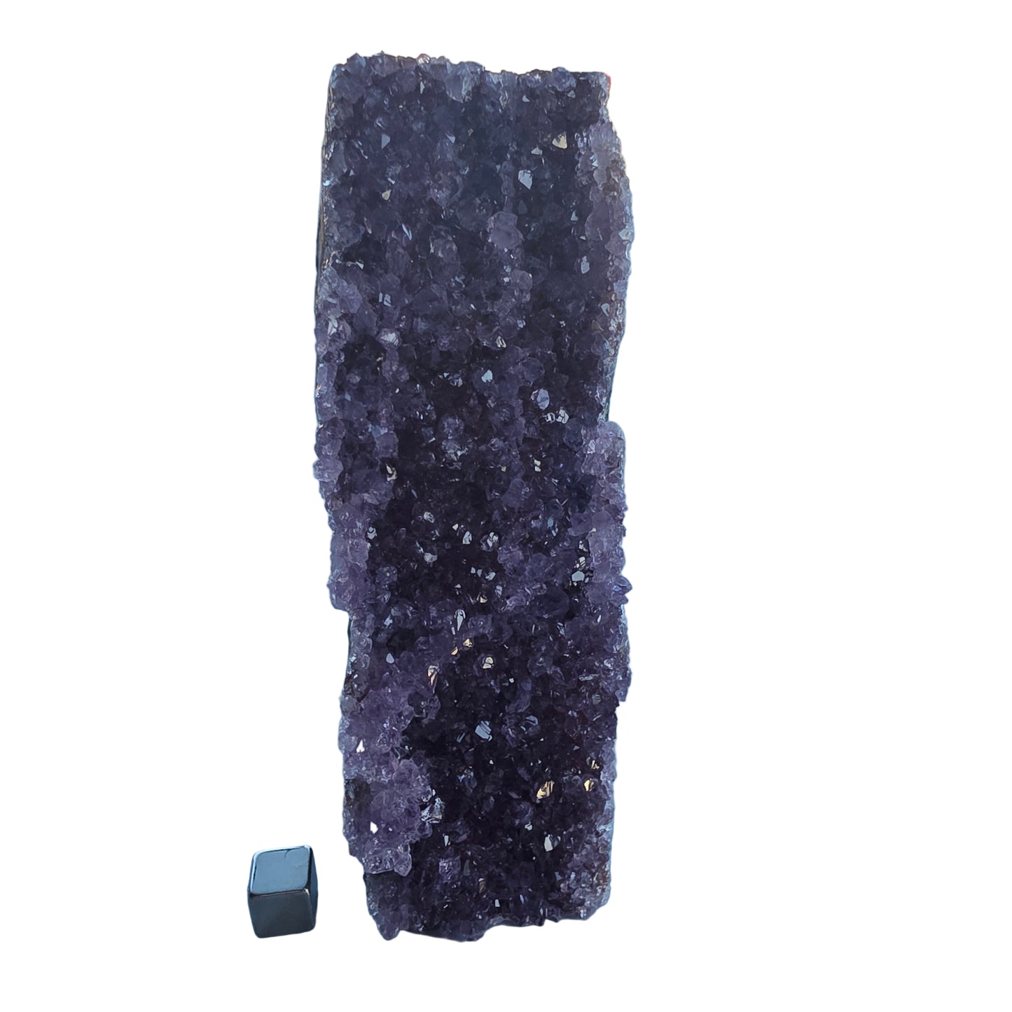 Rå ametyst krystal med dyb lilla farve.