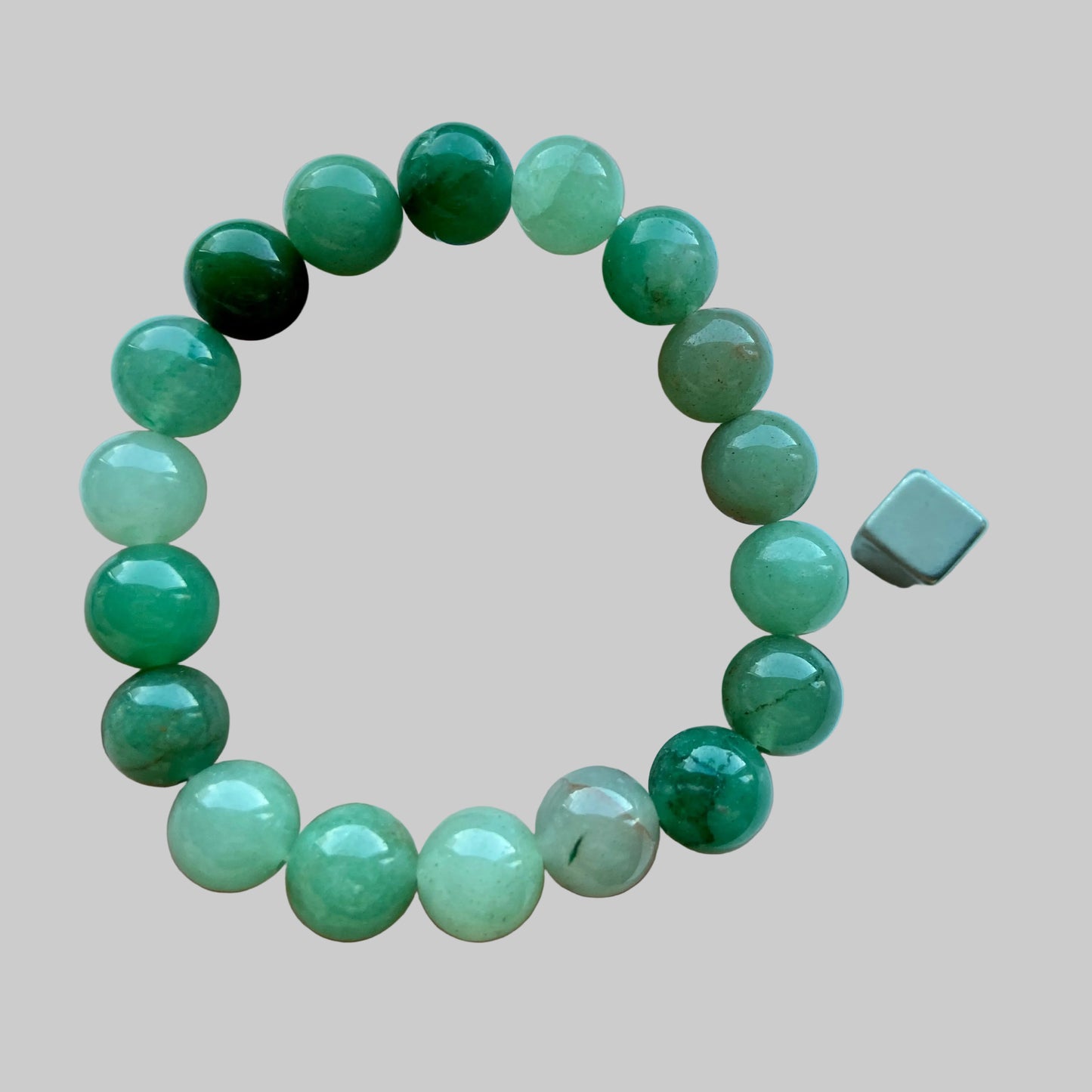 Armbånd med grøn aventurin for held og indre balance.