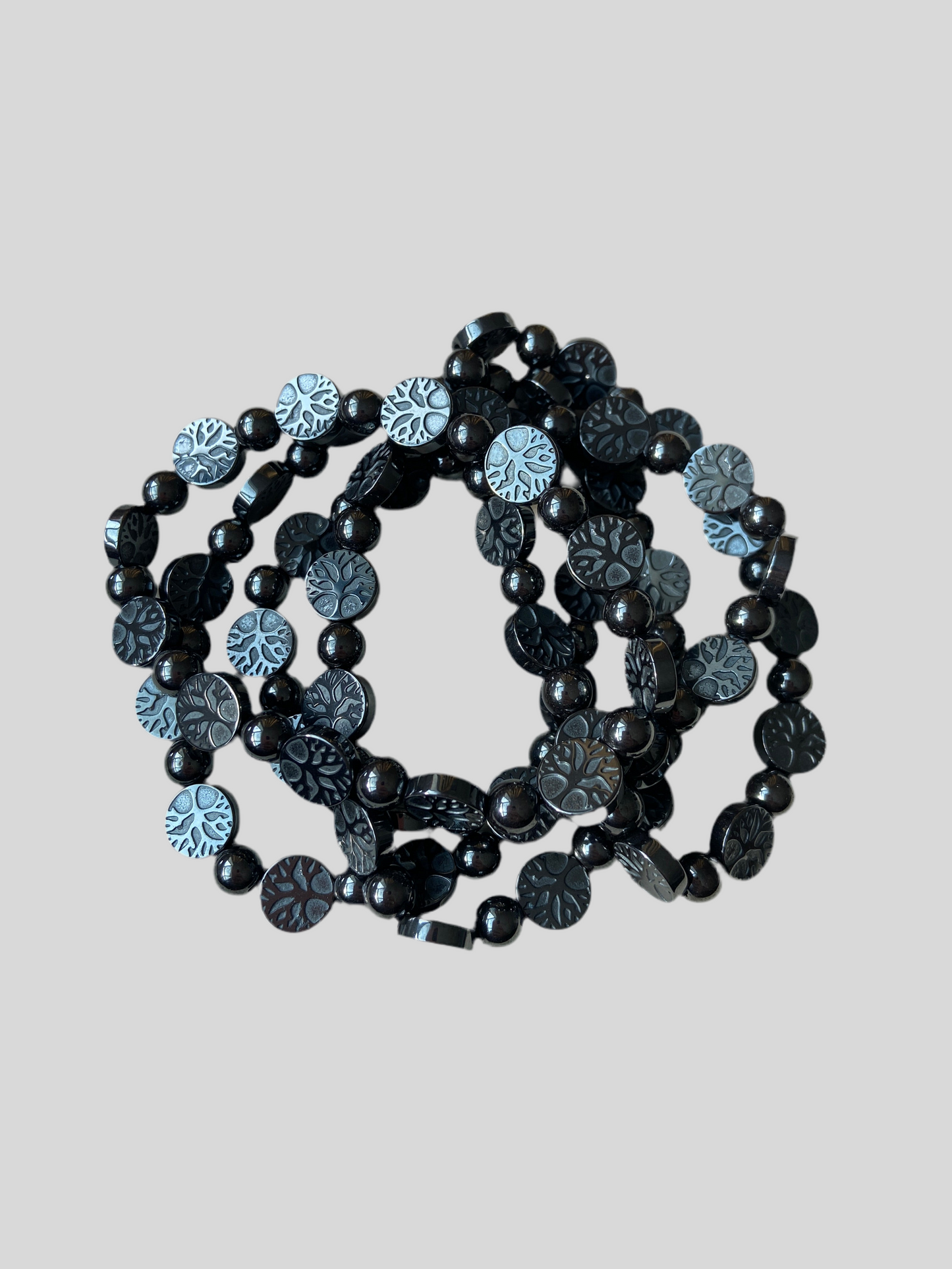 Armbånd i hæmatit med Livets Træ for personlig power og styrke.