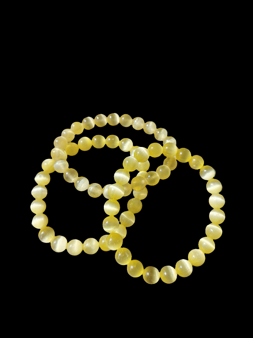 Selenit armbånd belagt i gul med høj vibration og lysenergi.