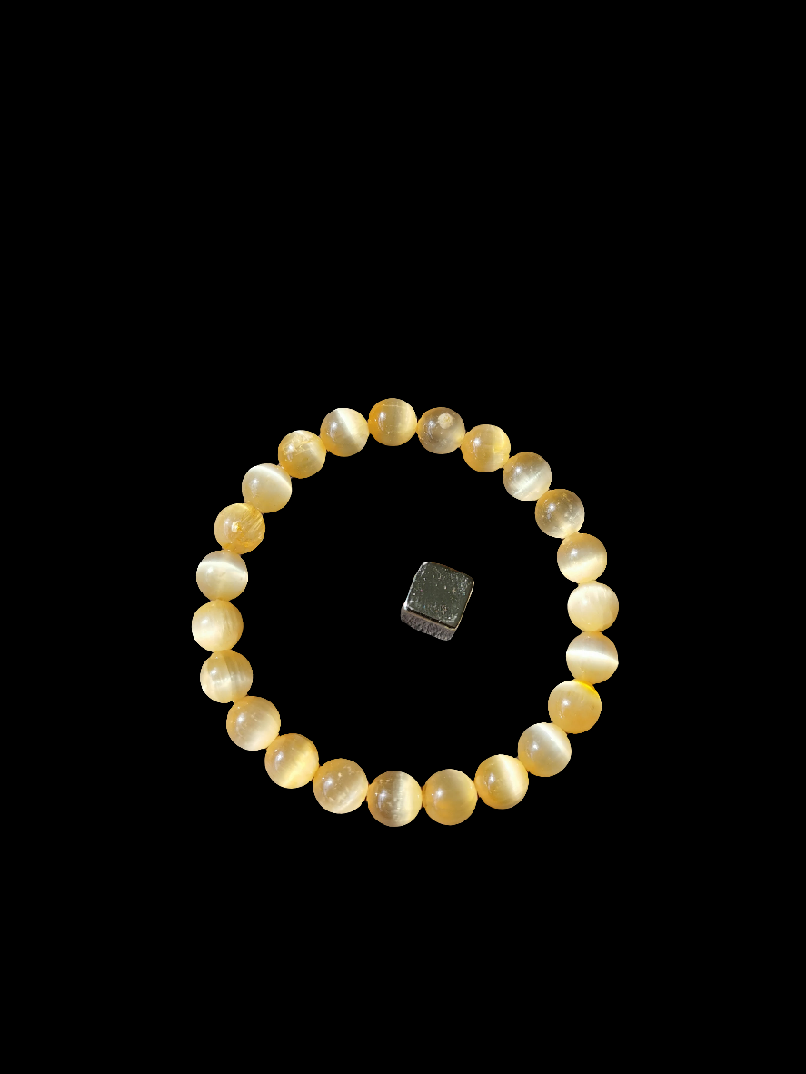 Selenit armbånd belagt i orange med høj vibration og lysenergi.