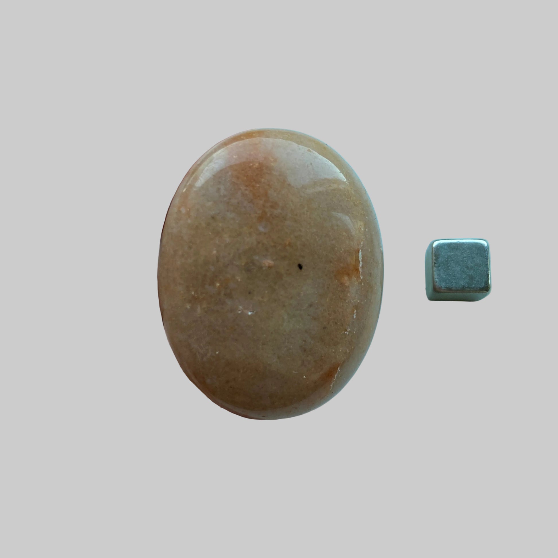 Fersken Aventurin palmstone med glæde, ro og selvtillid.