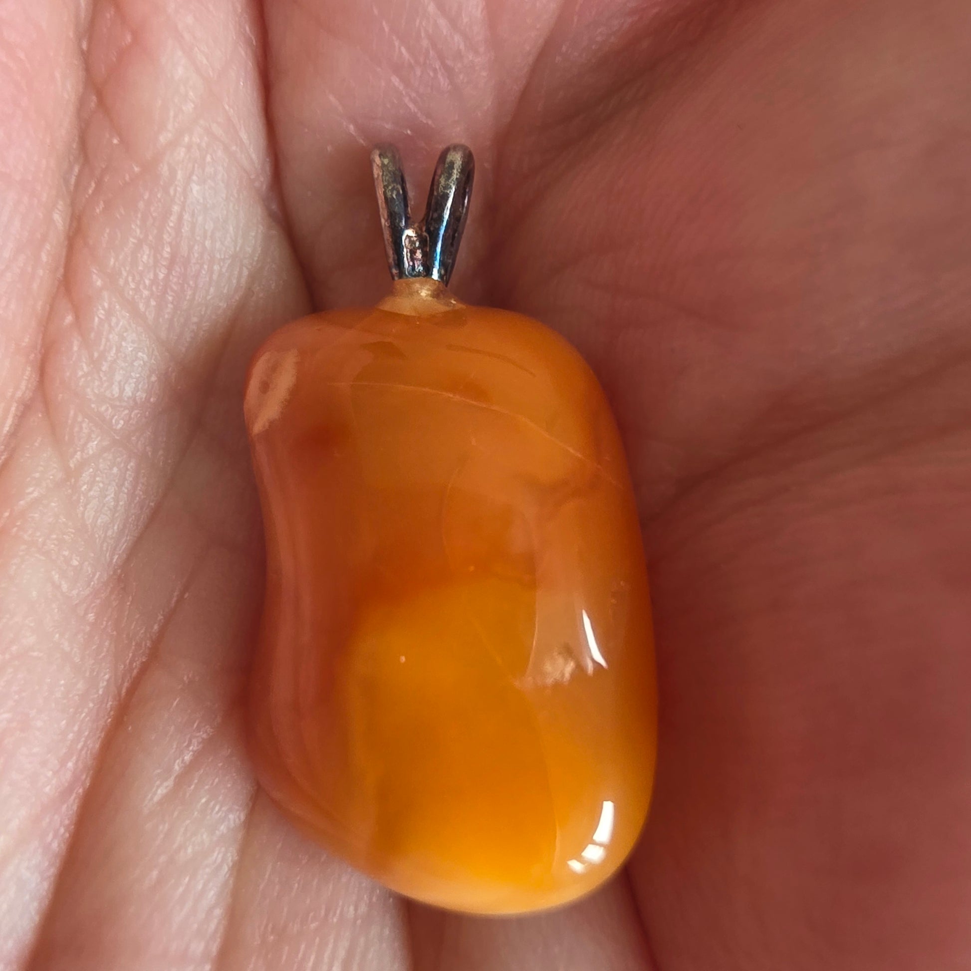 Fire opal silver jewelry with glowing colors and spiritual energy.