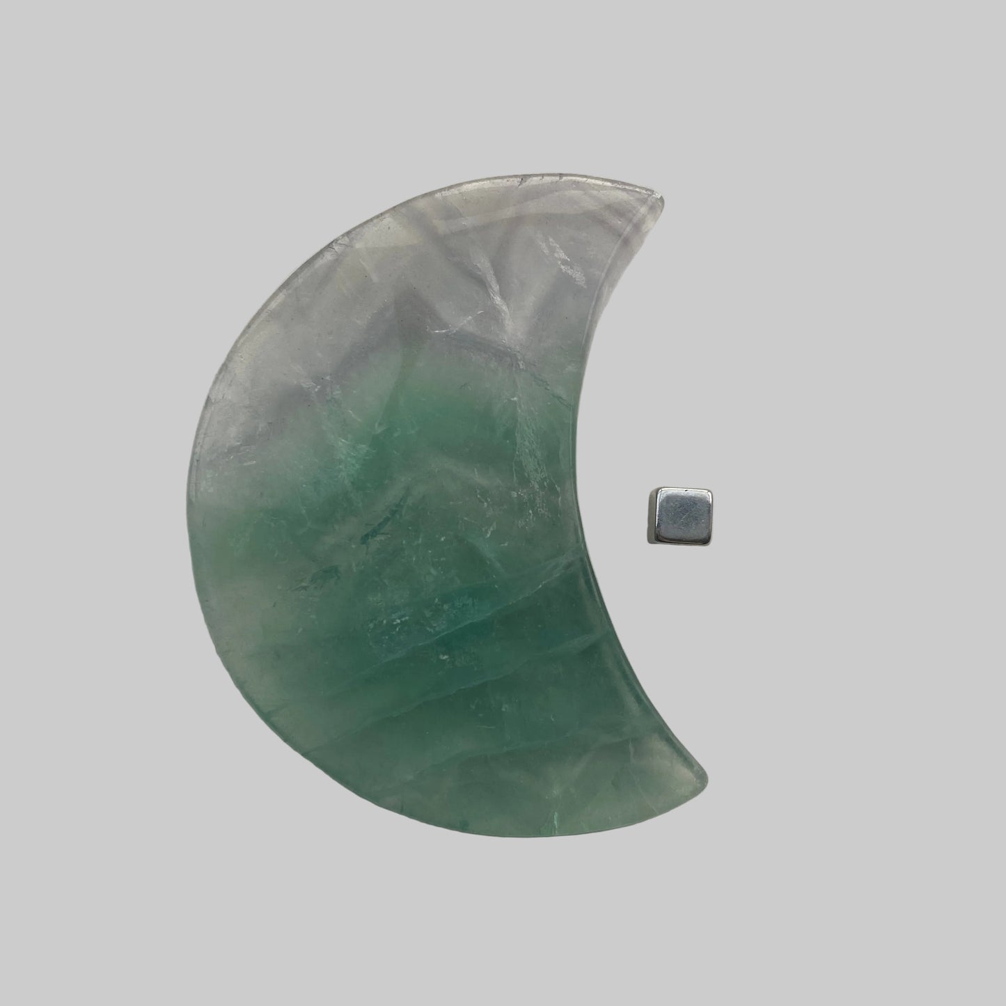 Regnbue fluorit måne der fremmer klarhed og fokus.