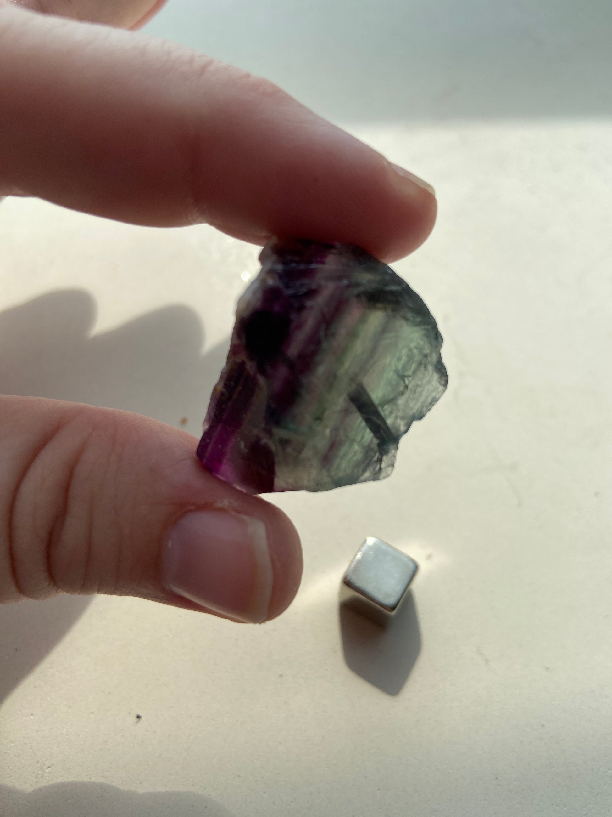 Grøn fluorit som fremmer positiv energi og livsglæde.