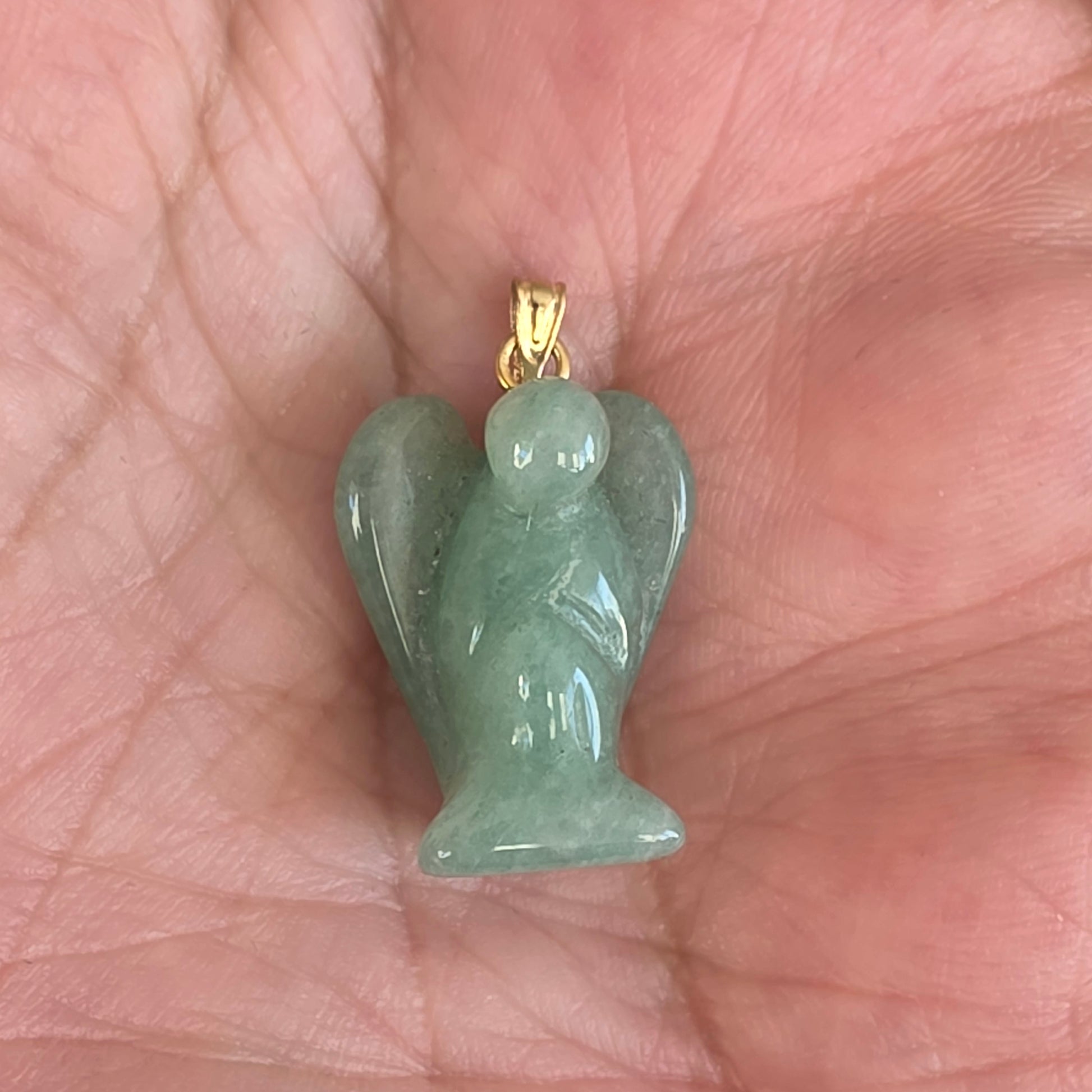 Grøn aventurin krystal for held, harmoni og personlig vækst.