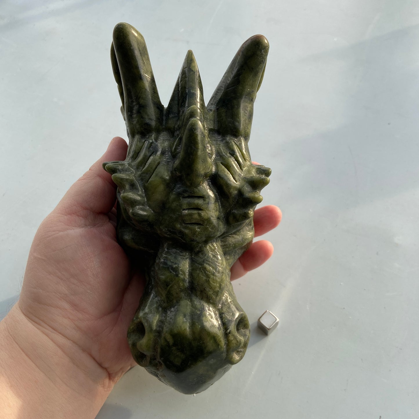 Grøn jade dragehoved der støtter realisering af dit fulde potentiale.