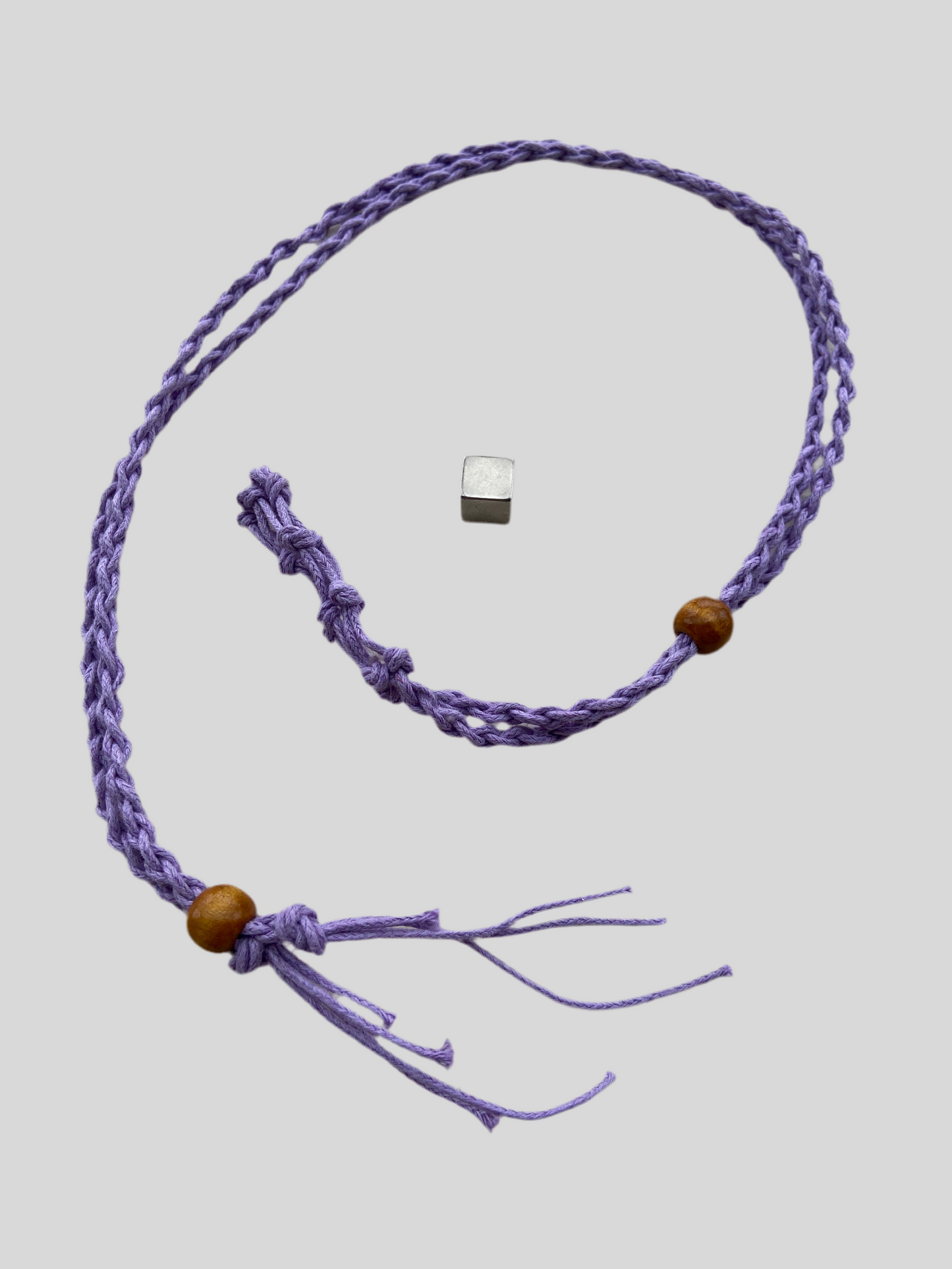 Krystalbur i lys lilla hør med plads til udskiftelig krystal.