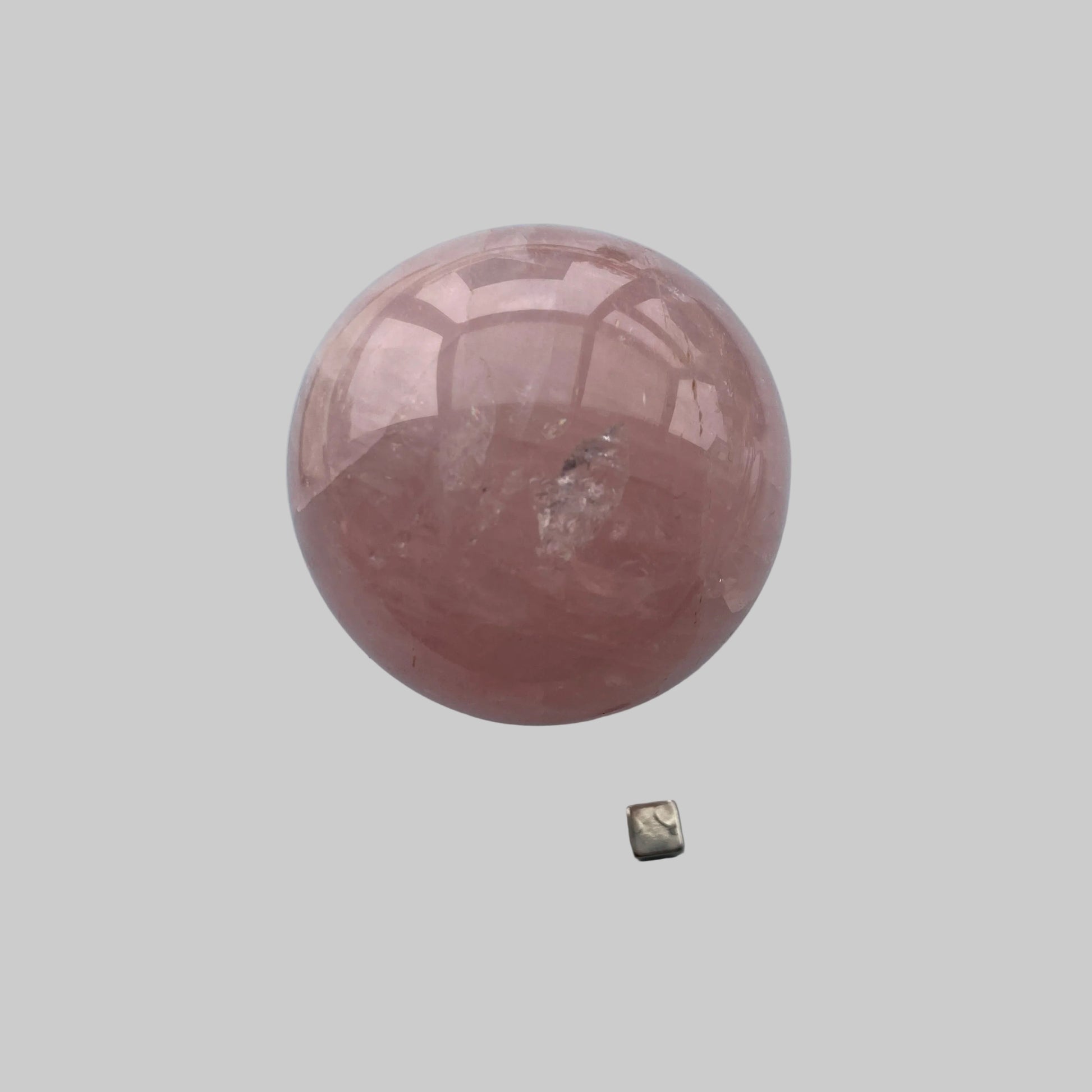 Rosakvarts kugle der hjælper dig tilbage i din power.