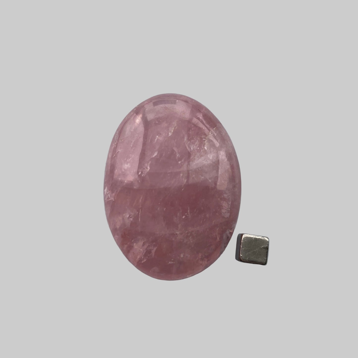 Rosakvarts palmstone der styrker selvkærlighed.