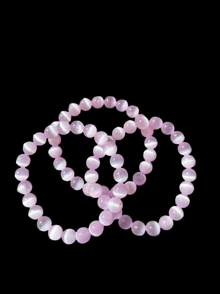 Lyserødt selenit armbånd til aktivering af kronechakra og sjælsstjerne.