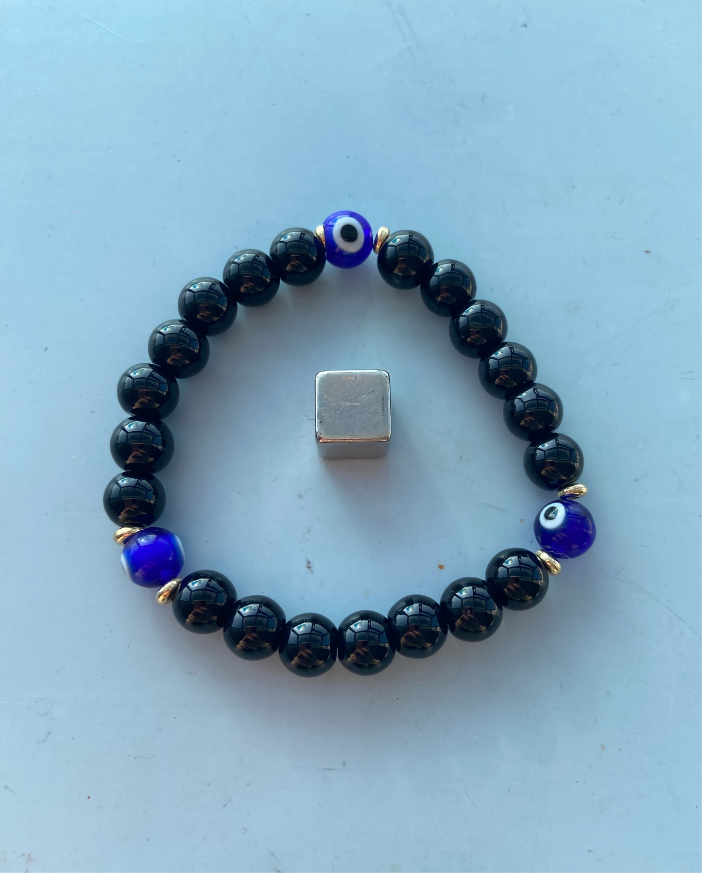 Sort Obsidian med Evil Eye – fuld beskyttelse mod indre skygger og ydre negativitet.