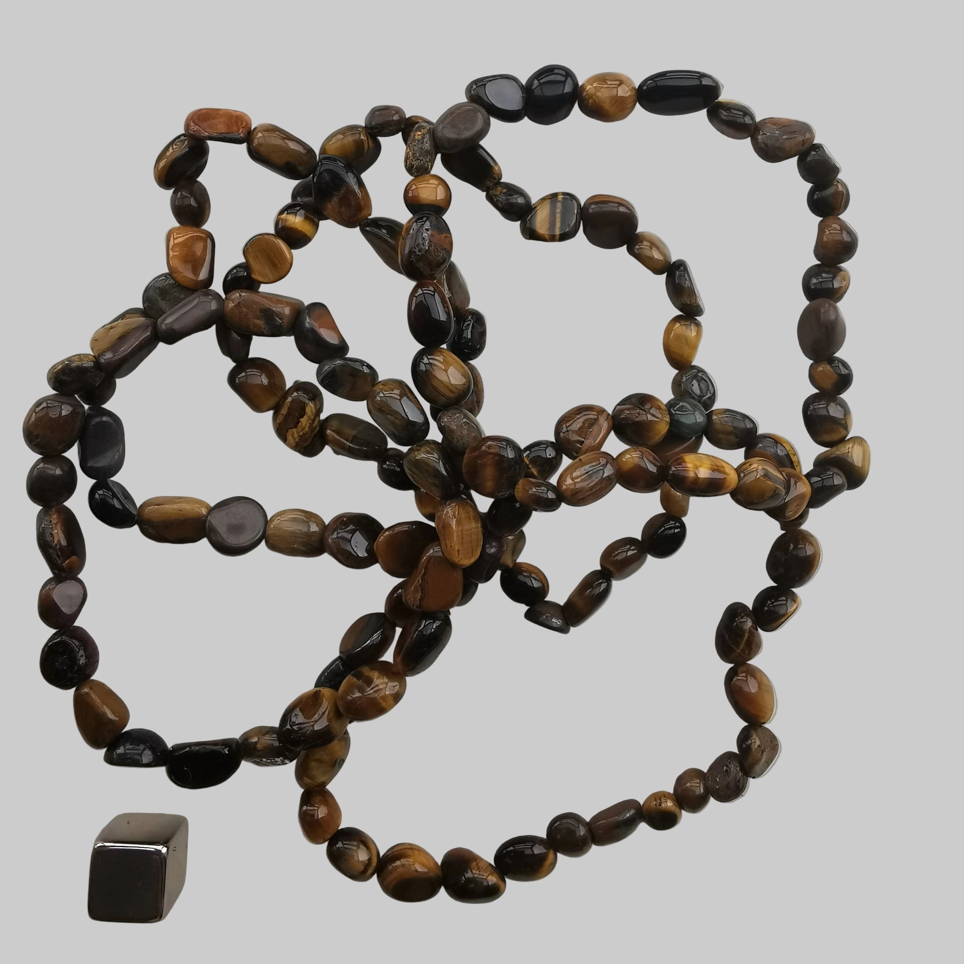 Tiger Eye bracelet med naturlige glansfulde krystalperler.