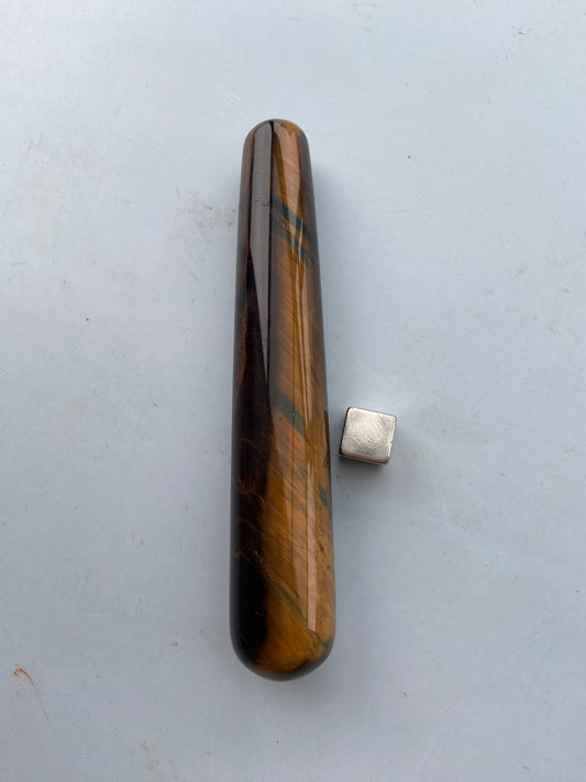 Tigerøje sten der lærer integritet og korrekt brug af personlig power.