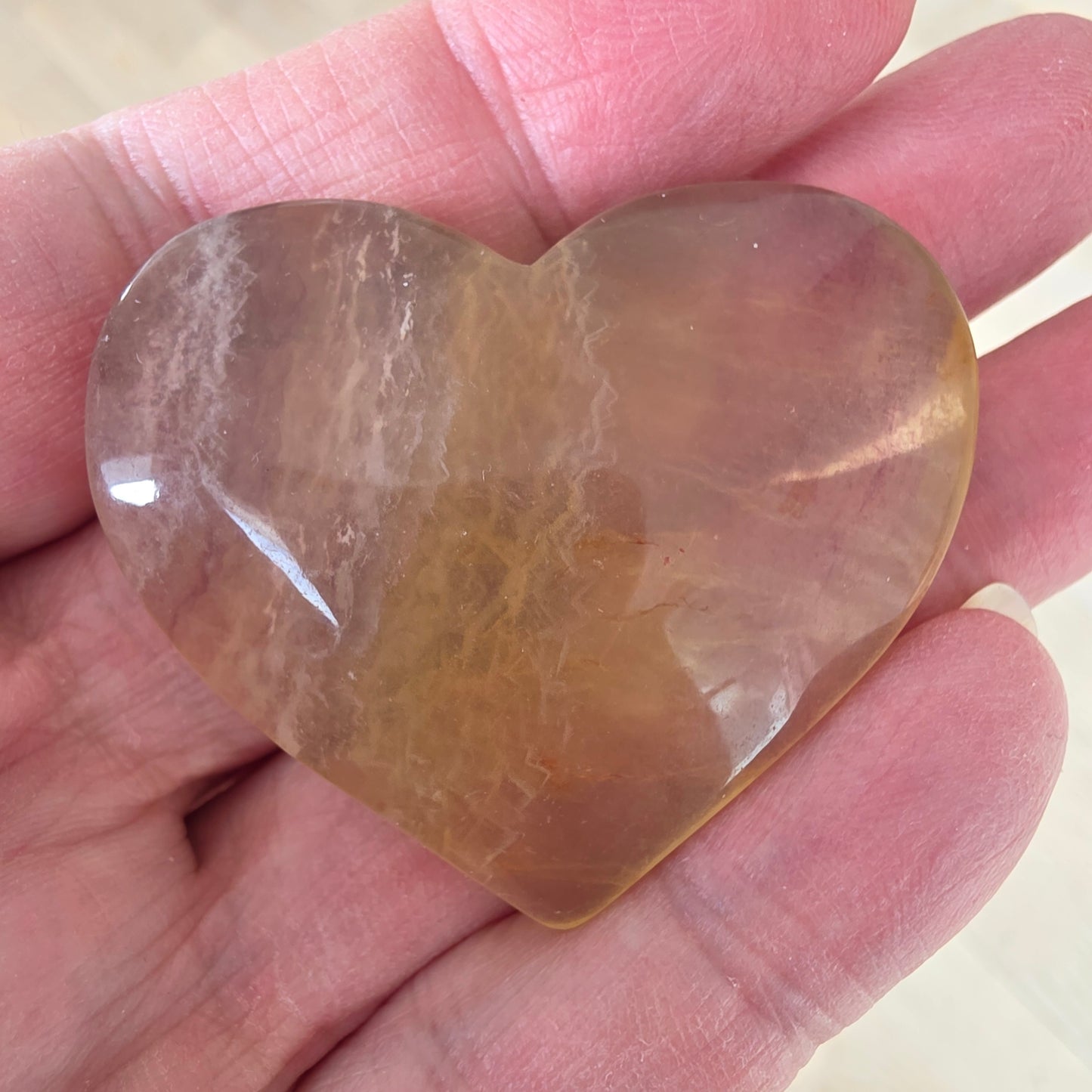 Yellow fluorite heart crystal with energy for clarity, creativity and renewal.