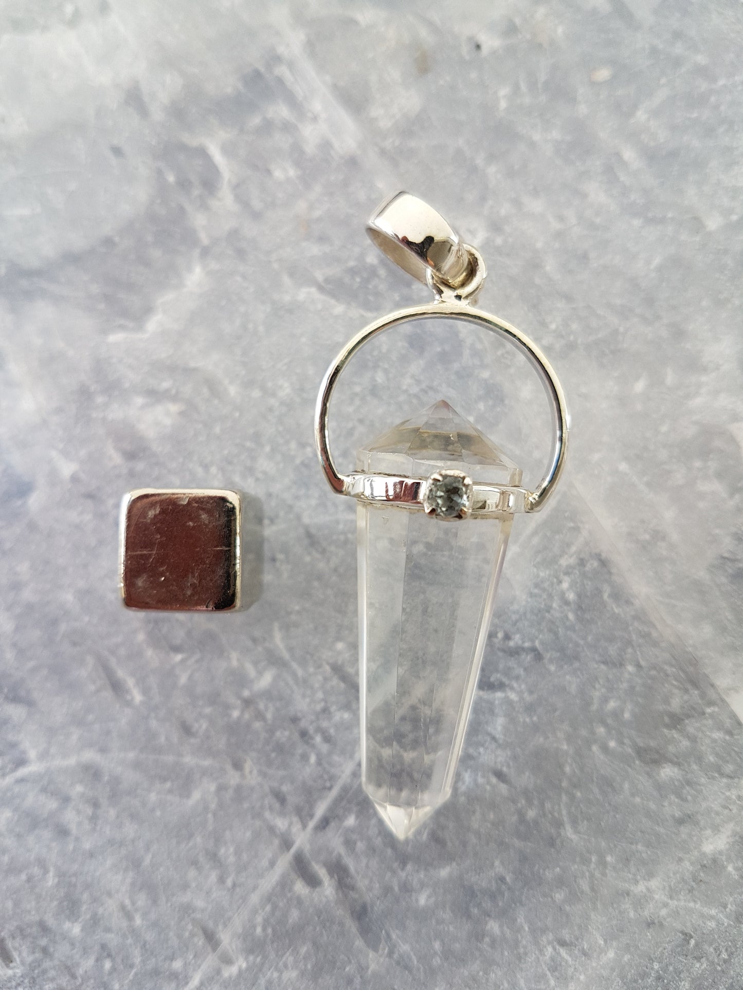 Rock crystal pendant with aquamarine crystal