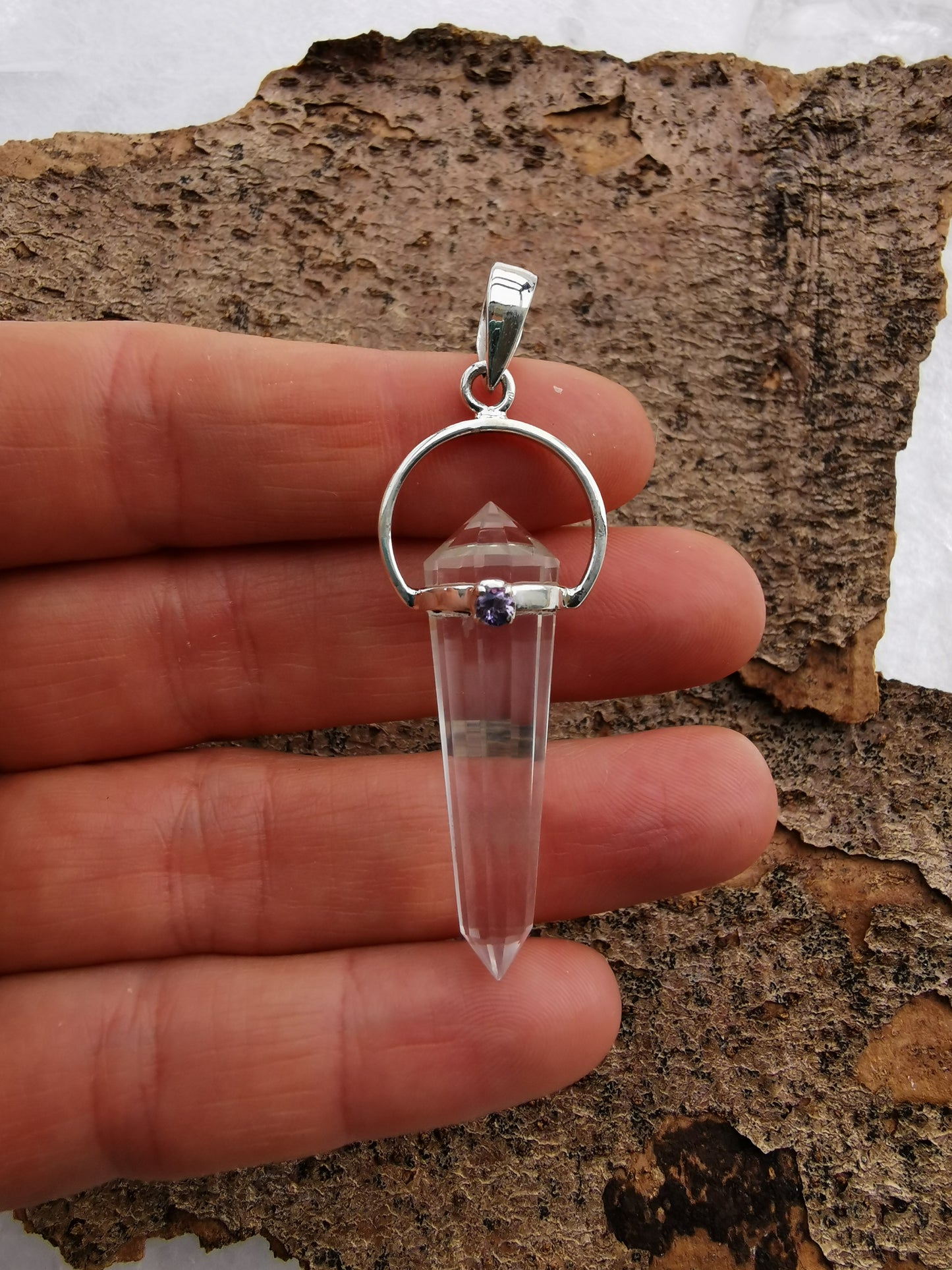Rock crystal pendant with amethyst crystal